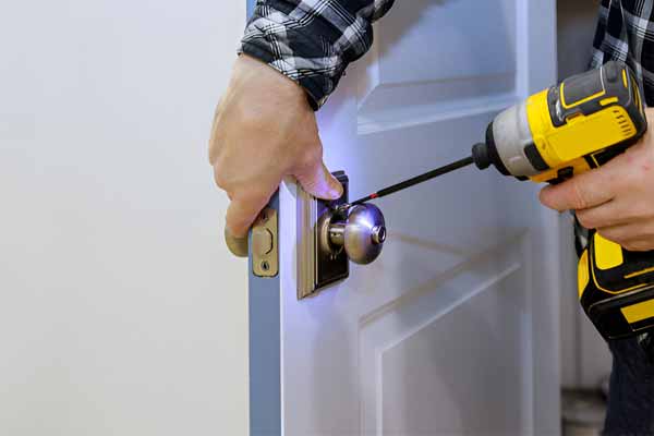 Residential Locksmith technician at work
